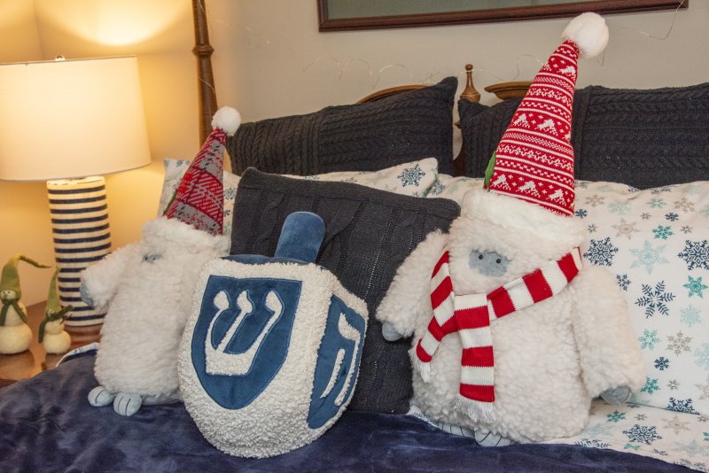Hanukkah and Yeti touches commingle in a bedroom in Marla and Tom Norton’s home.